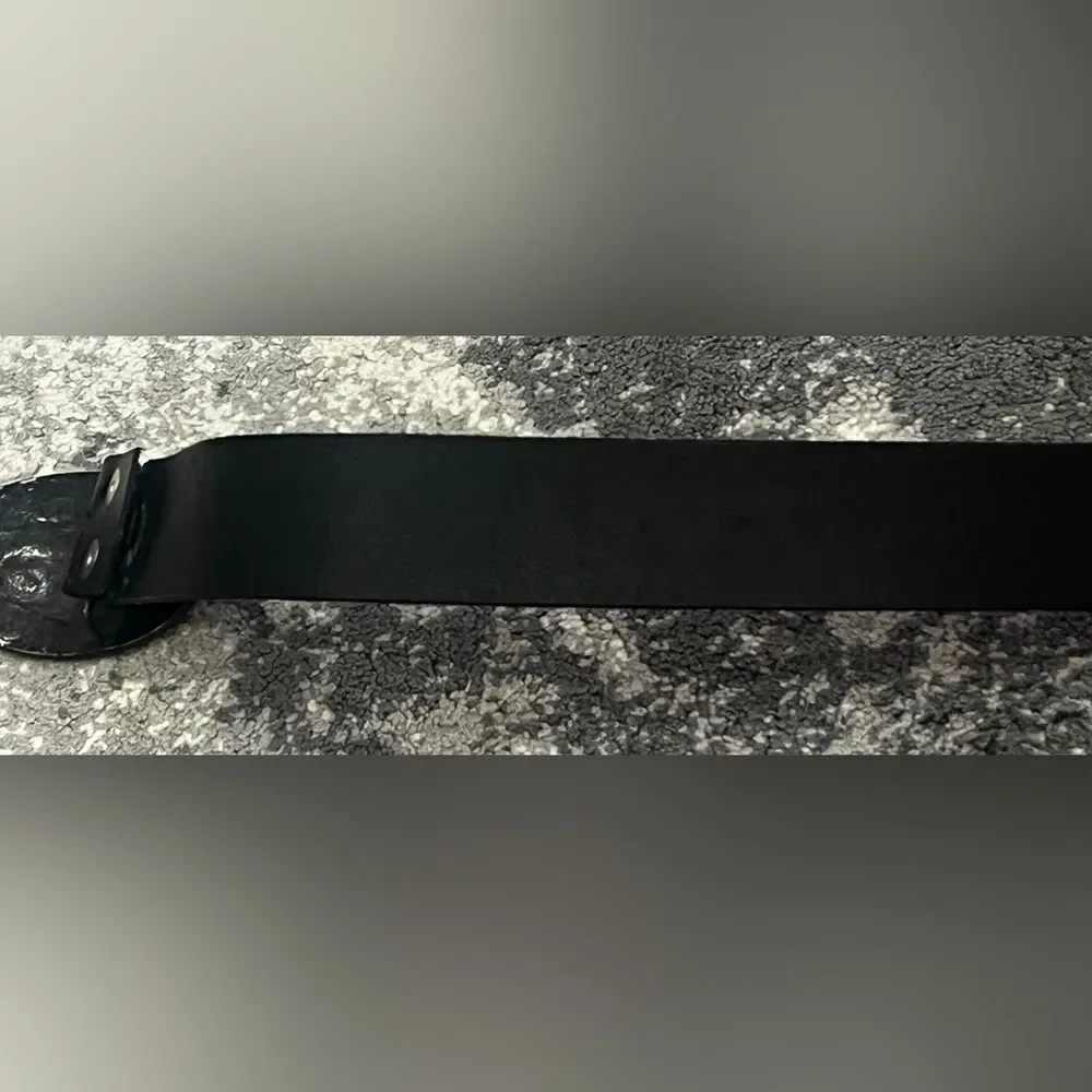 Confederate Civil War-style belt buckle on a Levis’s black leather belt L 38-40